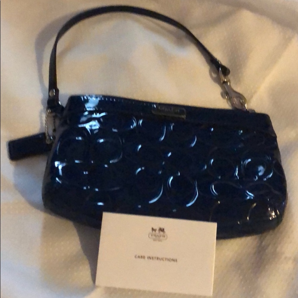 Coach navy blue patent leather wristlet